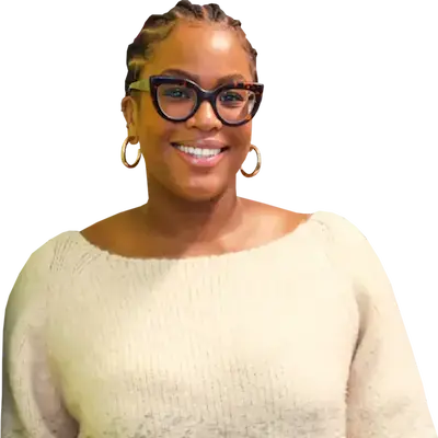 A portrait of Asha Edwin smiling.